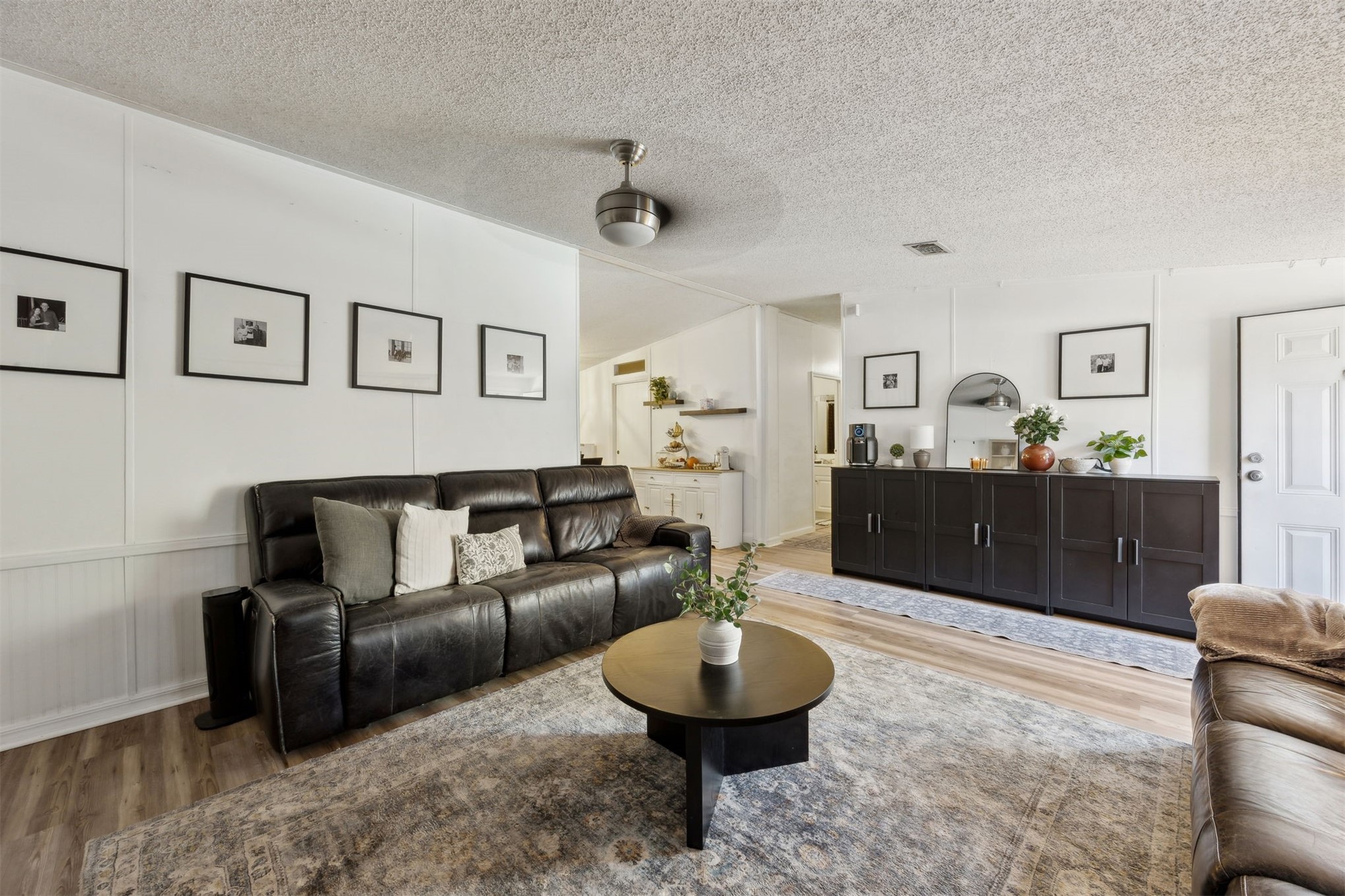 15461 Dewanna Road Jacksonville, FL 32218 - Photo 10 of 27 a living room with furniture and a wooden floor