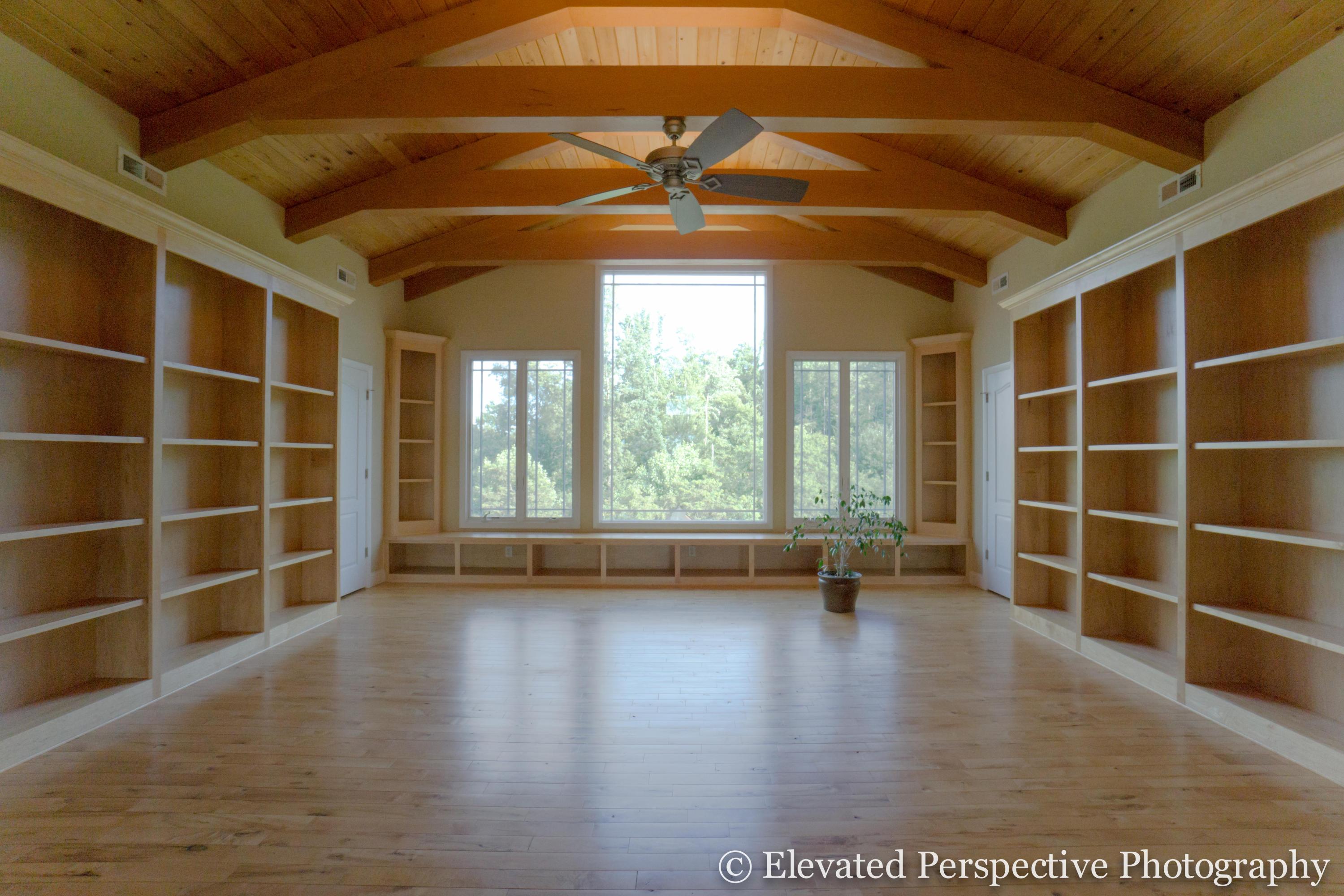 930 Northridge Road Hardy, VA 24101 - Photo 14 of 36 a view of an empty room with a window and wooden floor