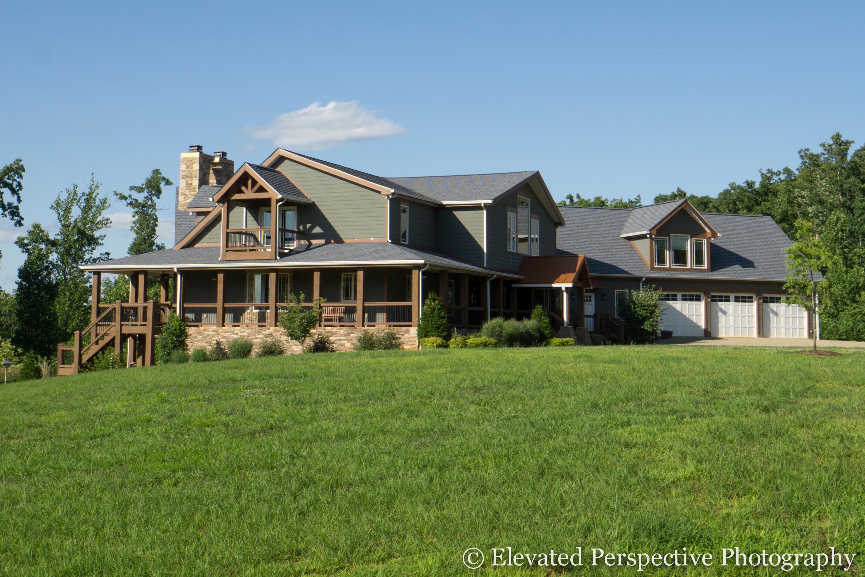 930 Northridge Road Hardy, VA 24101 - Photo 4 of 36 a front view of a house with a garden