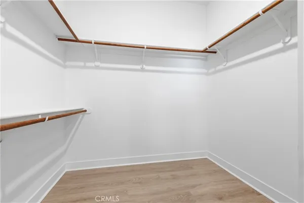 a view of an empty walk in closet