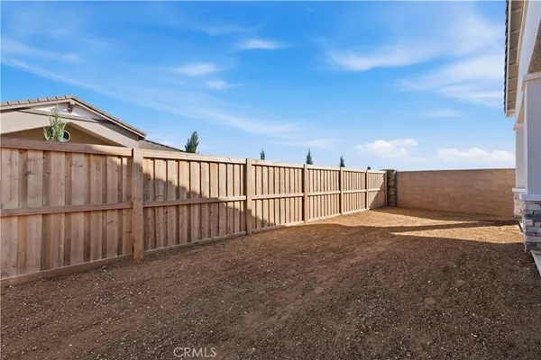a view of outdoor space with backyard
