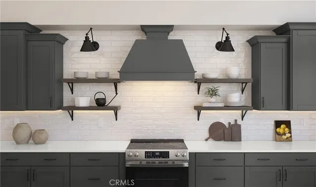 a kitchen with a sink and a refrigerator