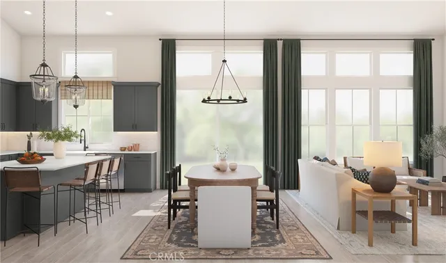 a room with dining table and chairs