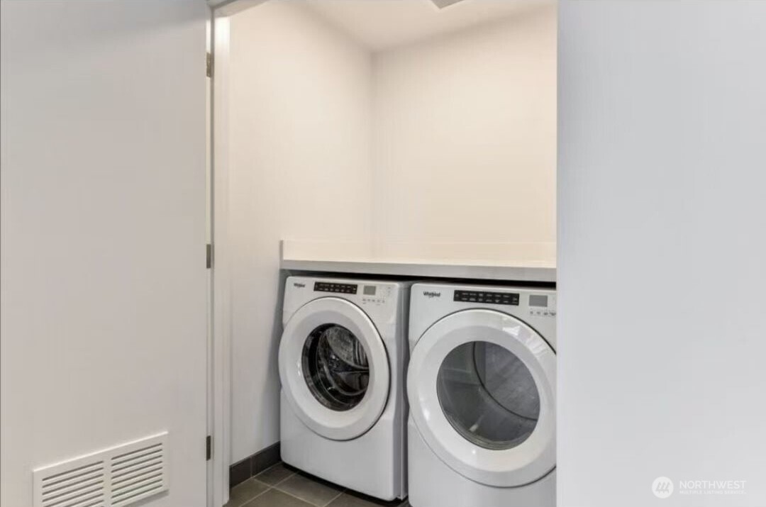 188 Bellevue Way Northeast, Unit 308 Bellevue, WA 98004 - Photo 11 of 19 a utility room with dryer and washer