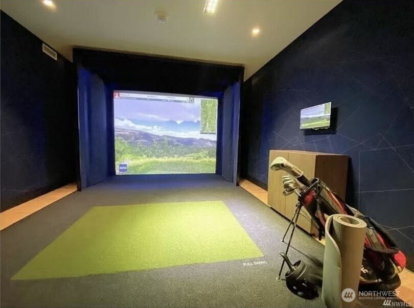 188 Bellevue Way Northeast, Unit 308 Bellevue, WA 98004 - Photo 7 of 19 a view of a projector room with gym equipment