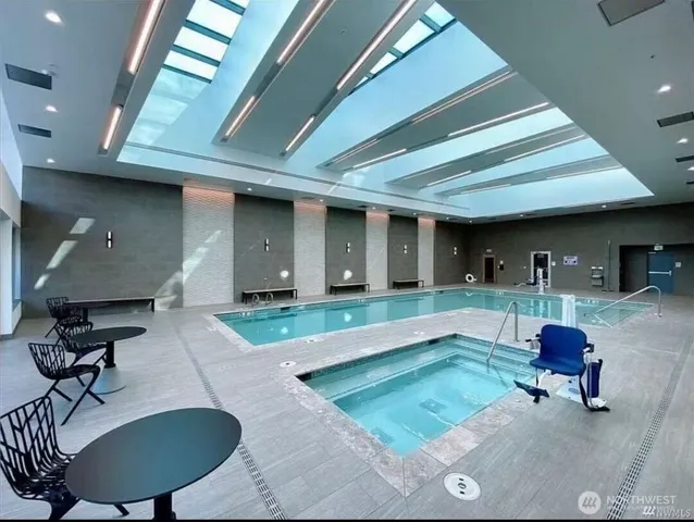 a gym room with lots of gym equipment