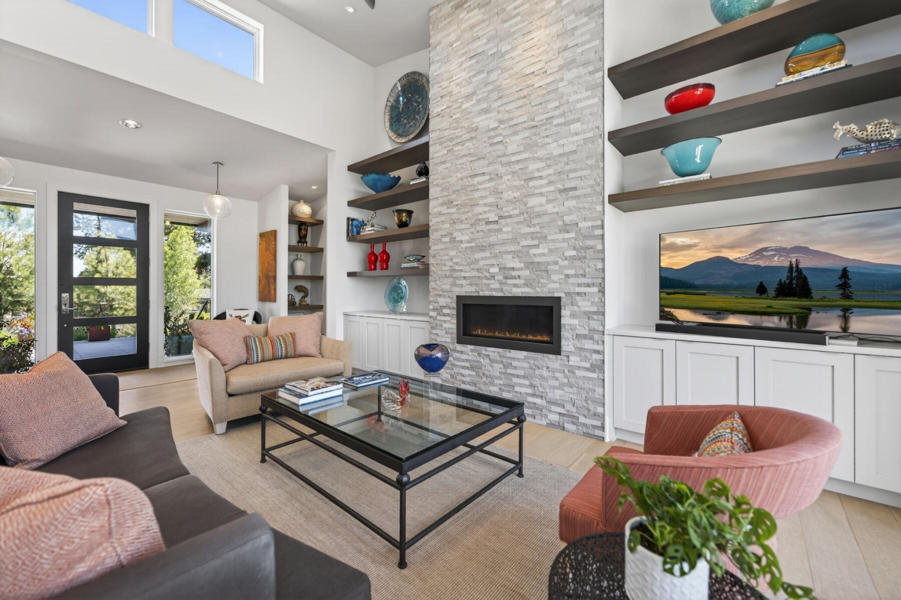61487 Hackleman Court Bend, OR 97702 - Photo 5 of 35 a living room with furniture and a flat screen tv