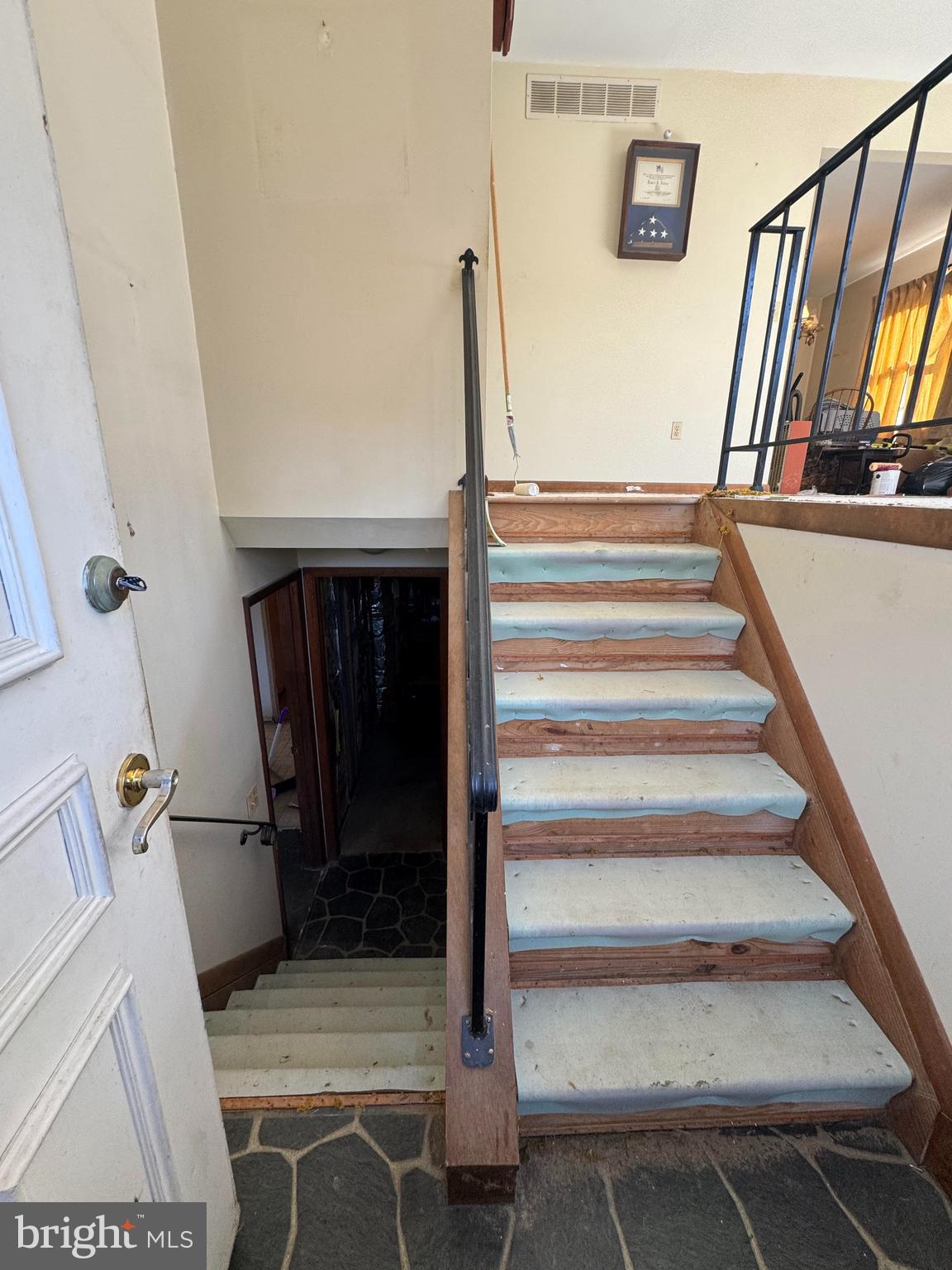 3603 Muddy Creek Road Edgewater, MD 21037 - Photo 17 of 20 a view of staircase with white walls and railing