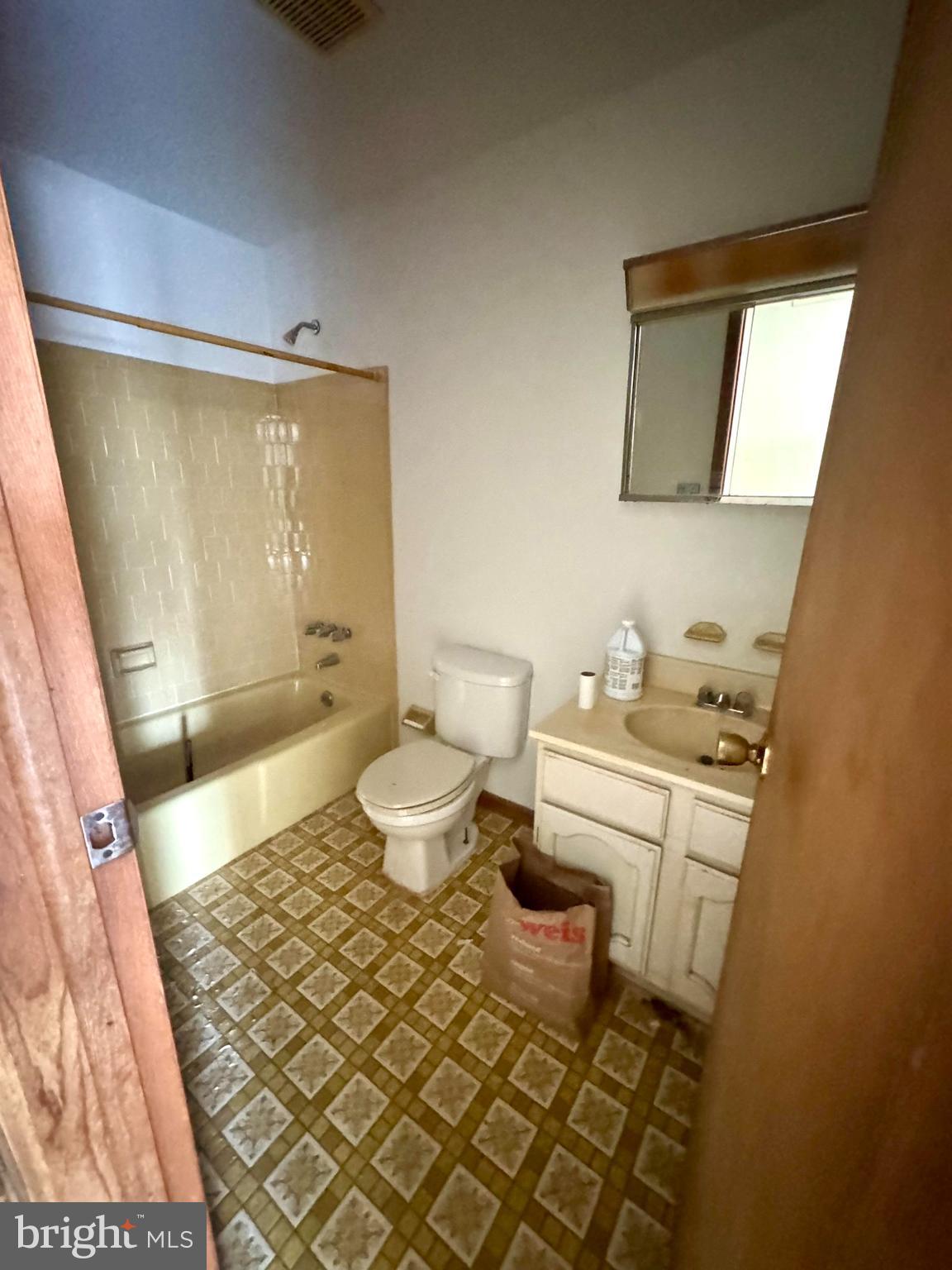 3603 Muddy Creek Road Edgewater, MD 21037 - Photo 20 of 20 a bathroom with a sink toilet and shower