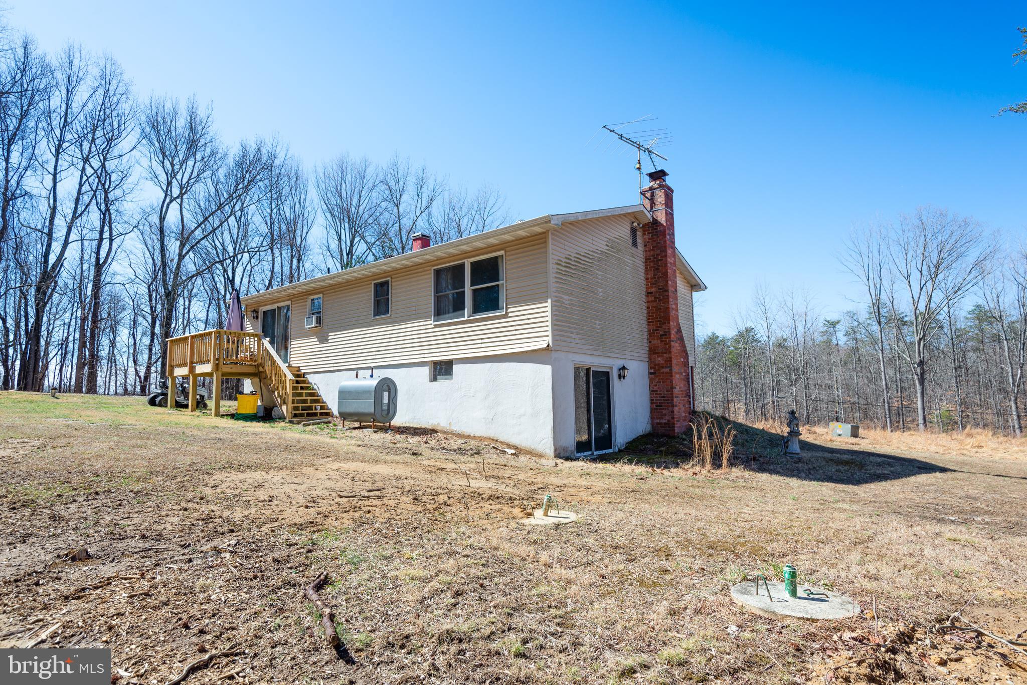 3603 Muddy Creek Road Edgewater, MD 21037 - Photo 5 of 20 a view of a house with a snow in the yard