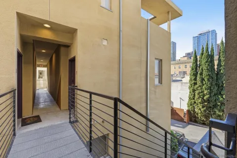 a view of a two chairs in front of a house