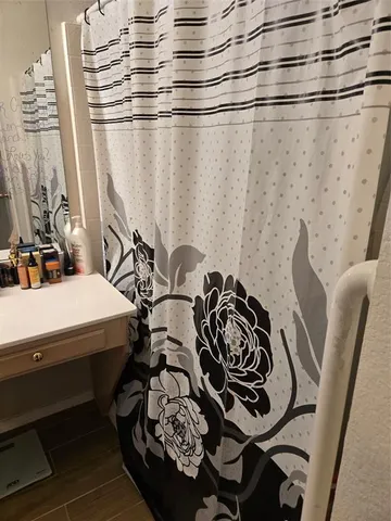 a view of a balcony with chairs