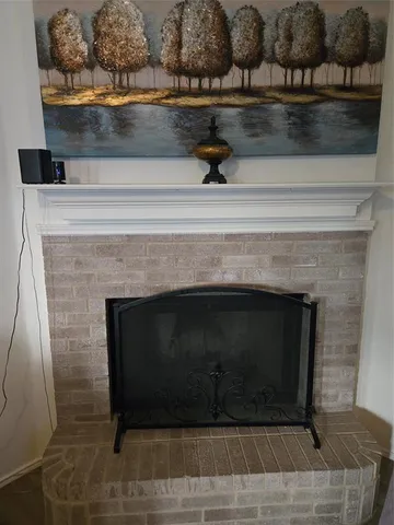 a living room with a fireplace