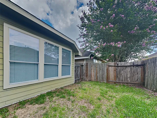 a house with a tree in front of it