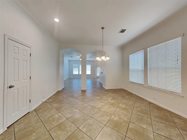 a view of a room with a chandelier