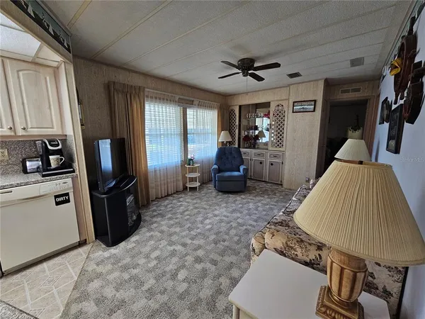 a living room with furniture and a couch