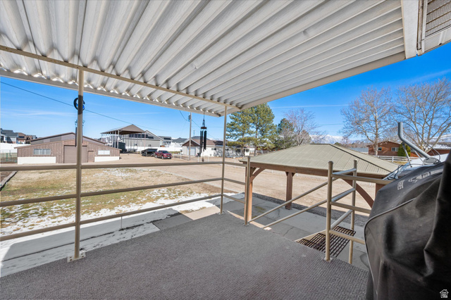 2298 West 800 North Clinton, UT 84015 - Photo 41 of 53 View of patio with a residential view and area for grilling