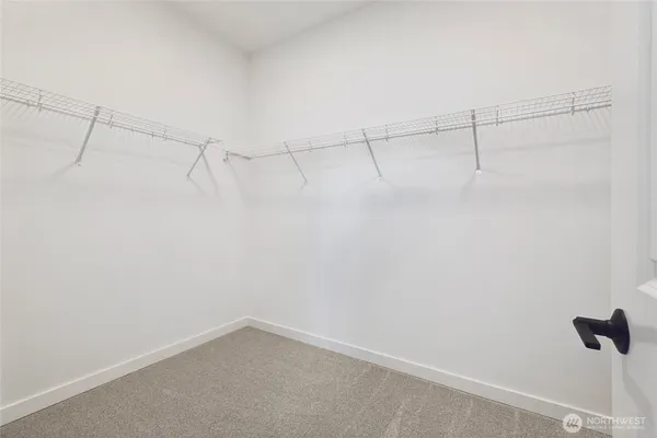 a view of a room with racks on the wall