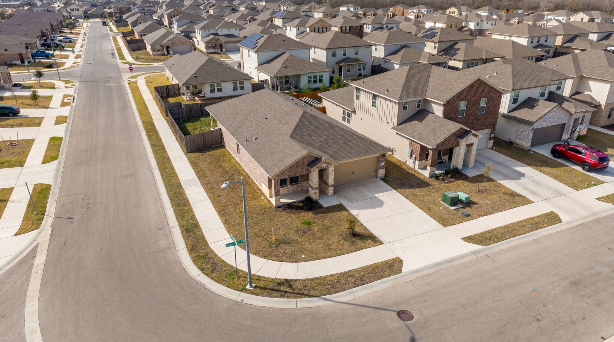 1003 Round Bale Road Hutto, TX 78634 - Photo 1 of 29 Aerial perspective of suburban area