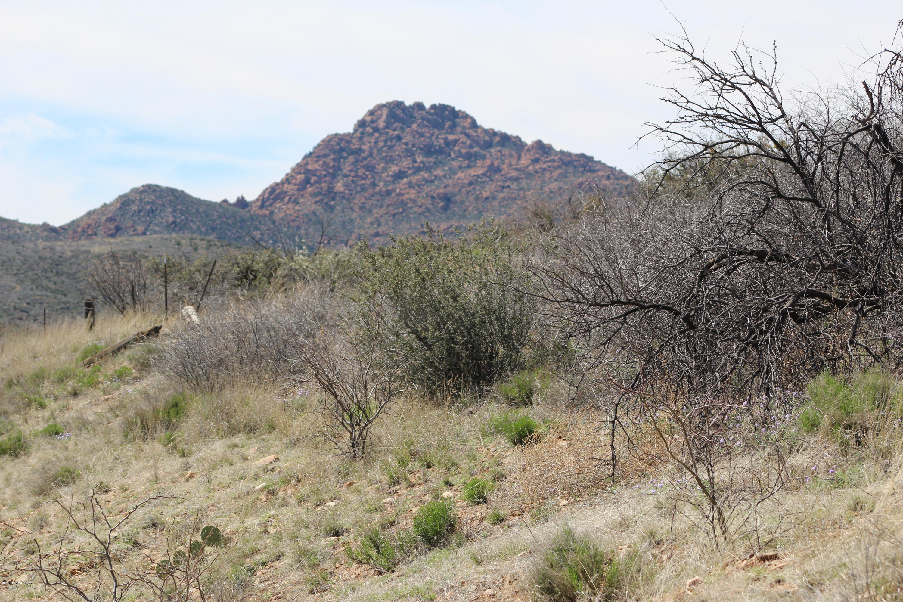 6850 Windmill Road Skull Valley, AZ 86338 - Photo 1 of 23 West view from driveway