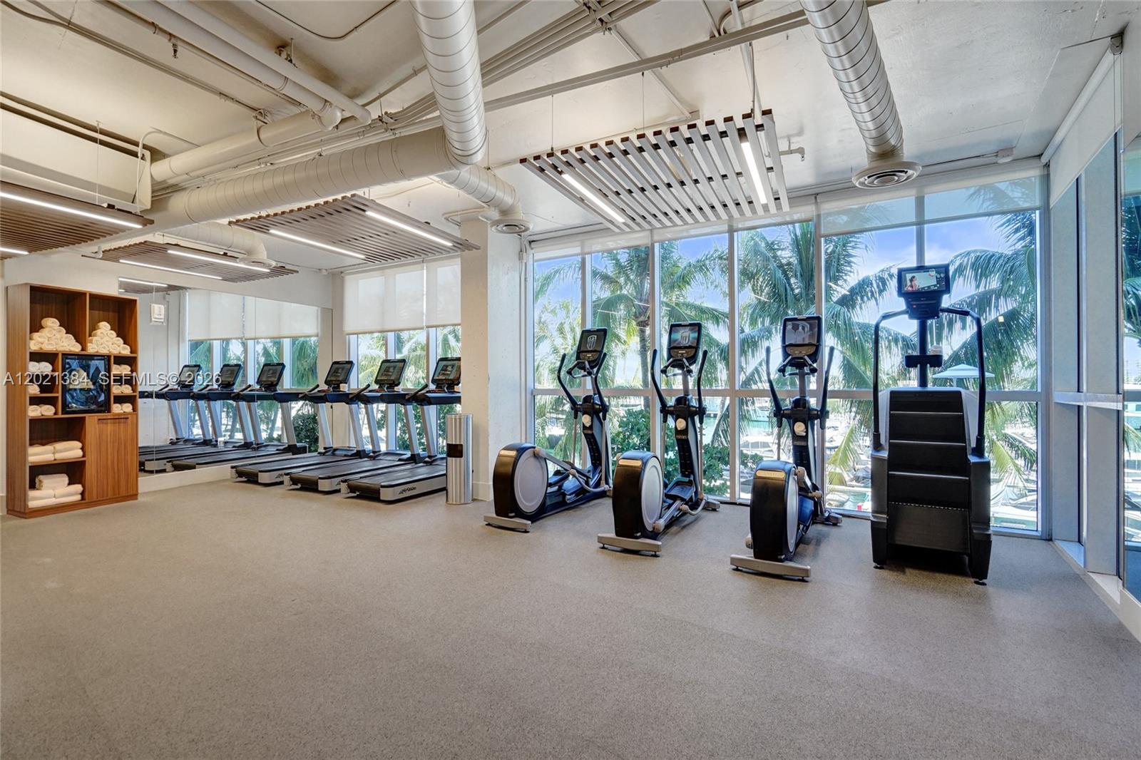 400 Alton Road, Unit PH11 Miami Beach, FL 33139 - Photo 44 of 49 a view of a room with gym equipment