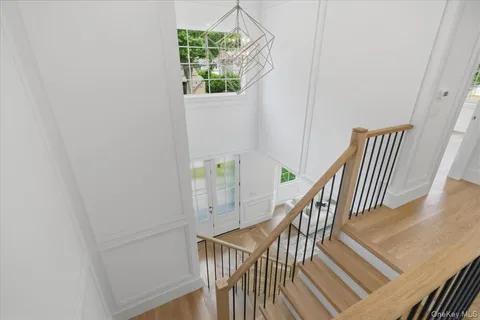 a view of entryway with wooden floor