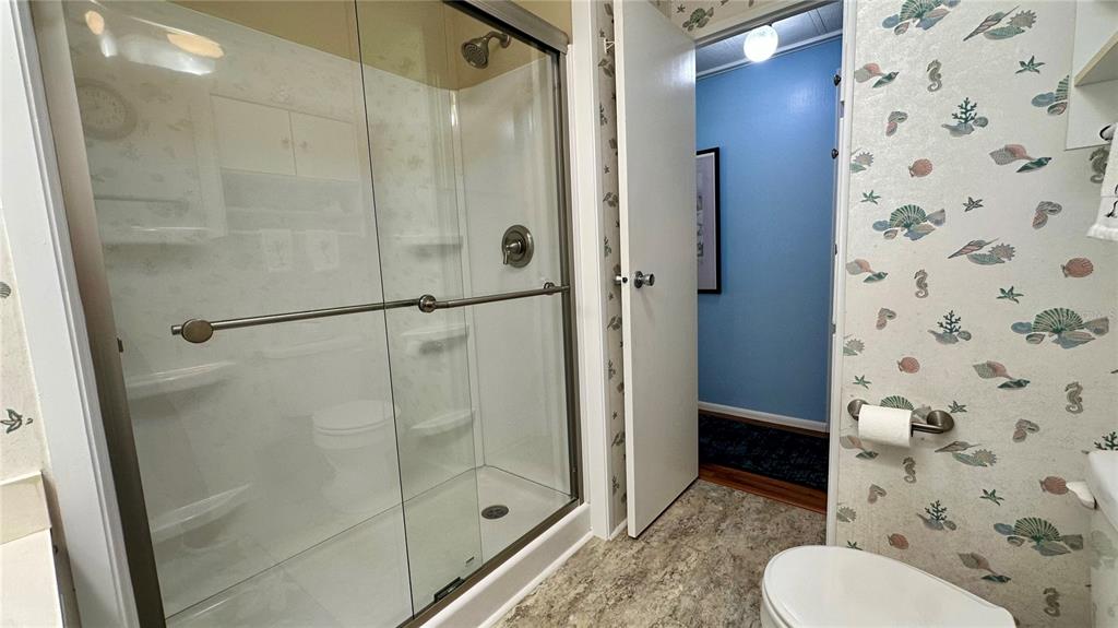 5619 Bayshore Road, Unit 163 Palmetto, FL 34221 - Photo 28 of 44 a bathroom with a shower and toilet