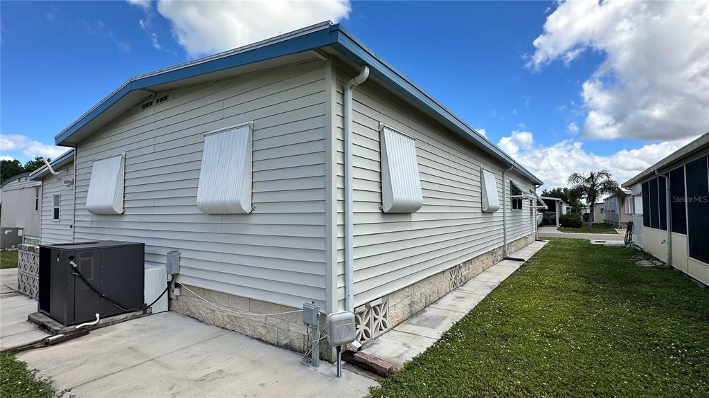 5619 Bayshore Road, Unit 163 Palmetto, FL 34221 - Photo 38 of 44 a view of a backyard with sitting area