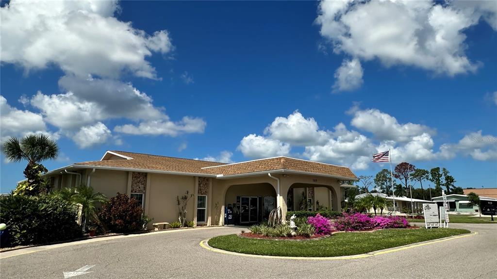 5619 Bayshore Road, Unit 163 Palmetto, FL 34221 - Photo 40 of 44 a front view of a house with garden