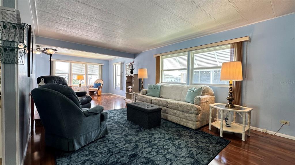 5619 Bayshore Road, Unit 163 Palmetto, FL 34221 - Photo 8 of 44 a living room with furniture and a window