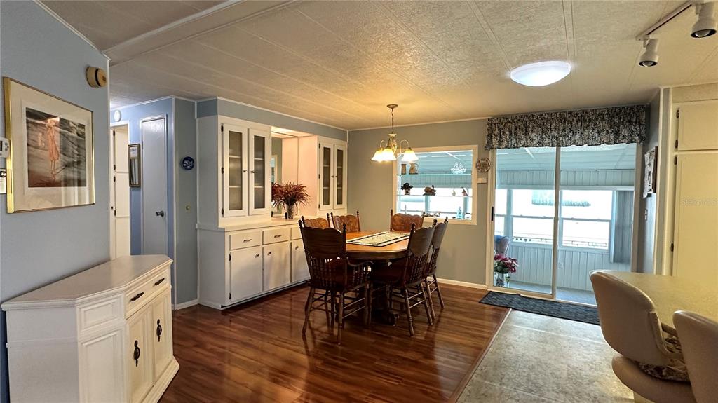 5619 Bayshore Road, Unit 163 Palmetto, FL 34221 - Photo 9 of 44 a view of a dining room with furniture and window