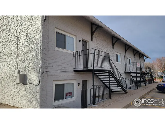 a black and white photo of a house