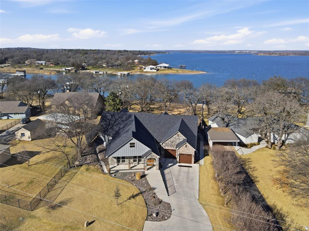 an aerial view of a residential houses with outdoor space