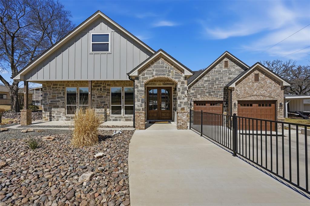 11754 North Court Azle, TX 76020 - Photo 2 of 38 a front view of a house with glass doors