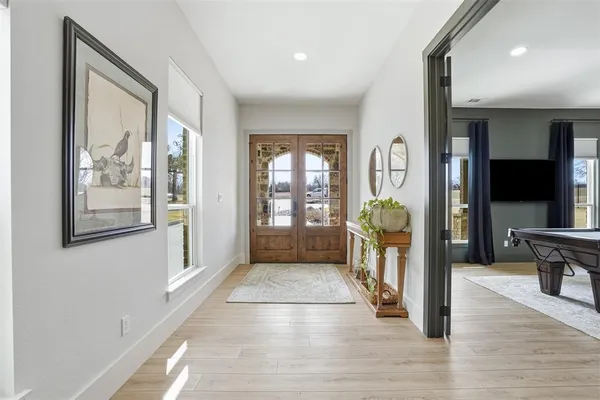 a view of livingroom with furniture and window