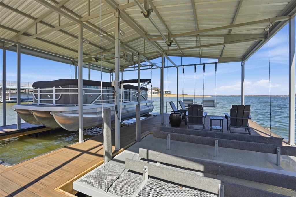 11754 North Court Azle, TX 76020 - Photo 35 of 38 a view of a swimming pool with a table and chairs