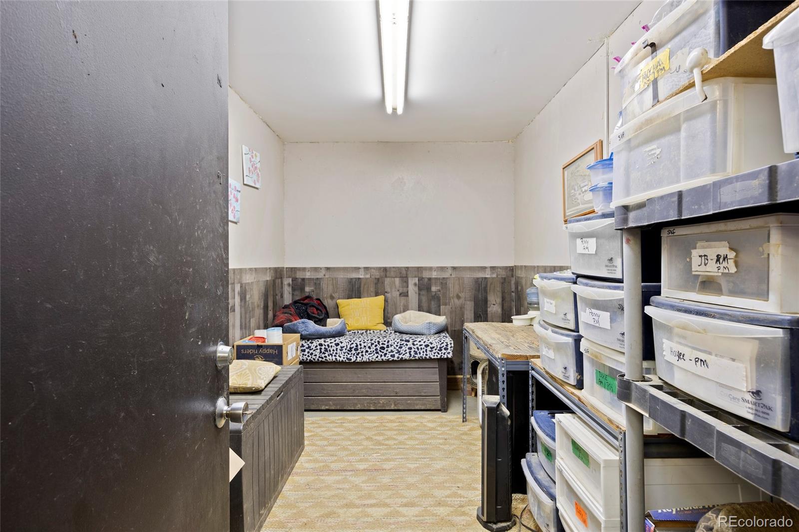 1705 Outter Marker Road Castle Rock, CO 80108 - Photo 17 of 40 a living room with furniture and a fireplace
