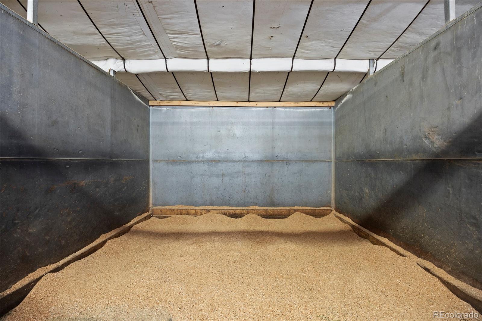 1705 Outter Marker Road Castle Rock, CO 80108 - Photo 21 of 40 a view of a room with a wooden floor
