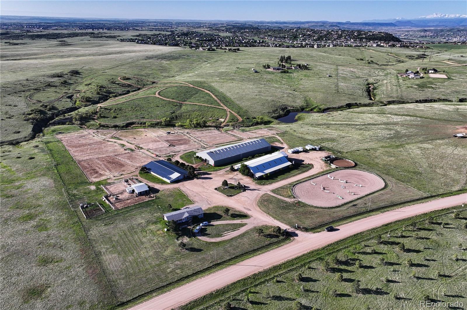 1705 Outter Marker Road Castle Rock, CO 80108 - Photo 36 of 40 an aerial view of a house with outdoor space