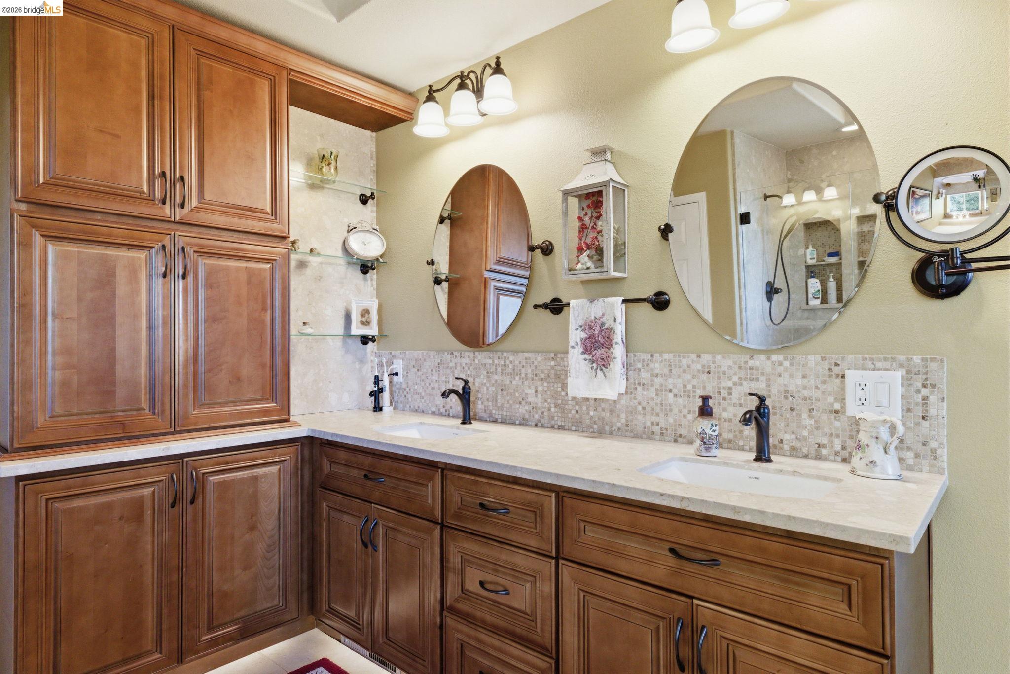 12808 Mammoth Mine Road Jamestown, CA 95327 - Photo 24 of 66 a bathroom with a granite countertop double vanity sink and a mirror
