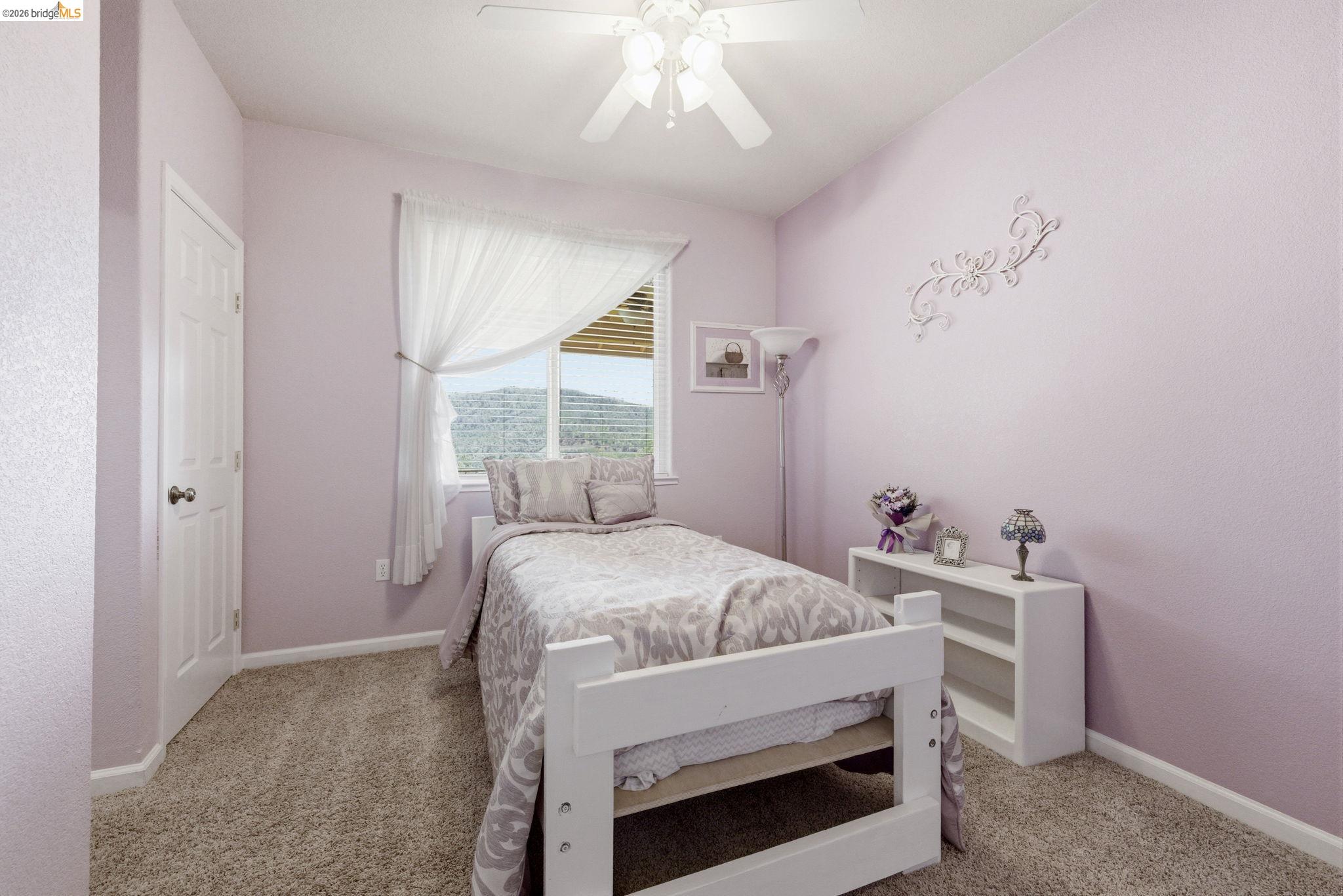 12808 Mammoth Mine Road Jamestown, CA 95327 - Photo 25 of 60 Bedroom with ceiling fan and light colored carpet