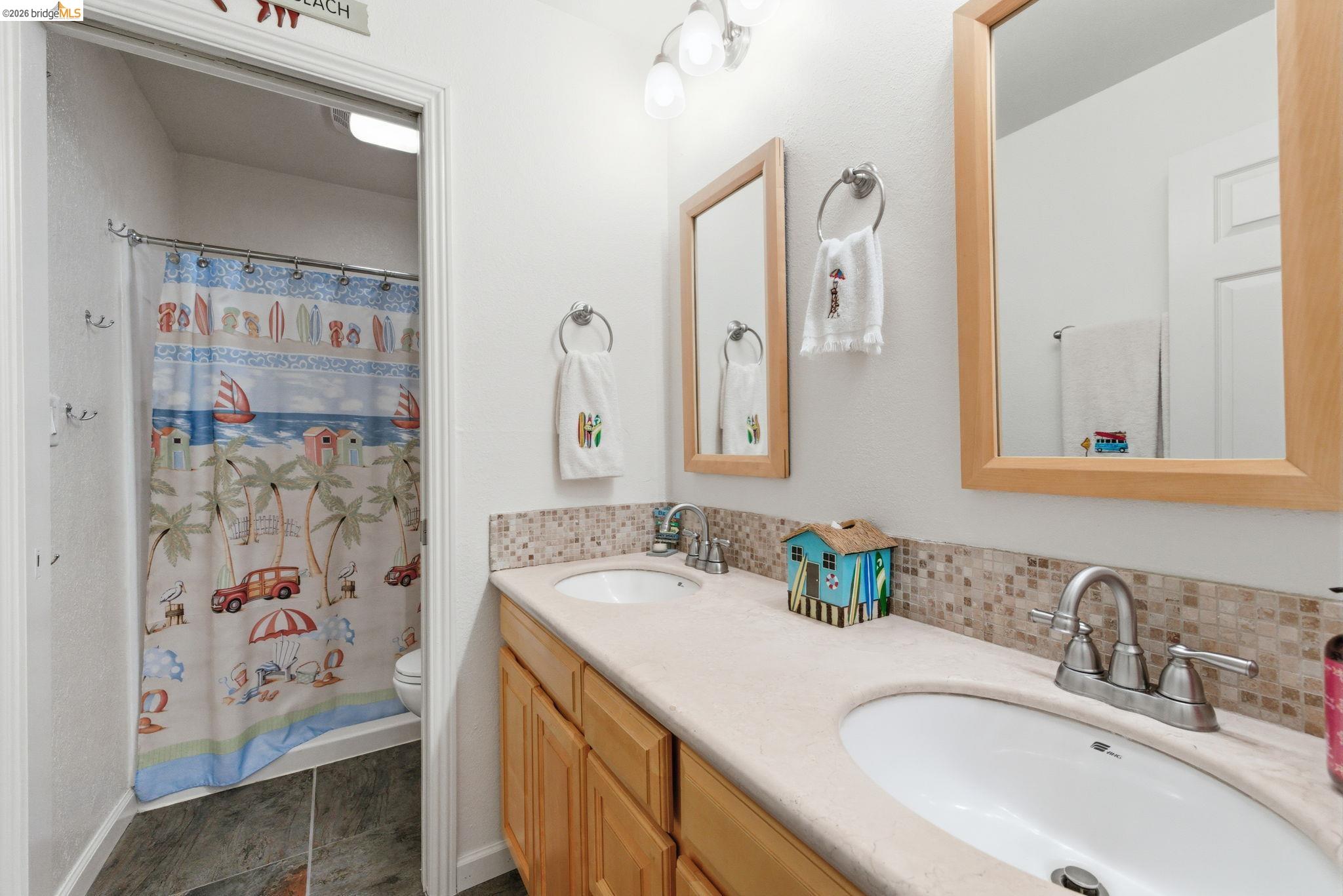12808 Mammoth Mine Road Jamestown, CA 95327 - Photo 32 of 60 Full bath featuring double vanity and a shower with curtain