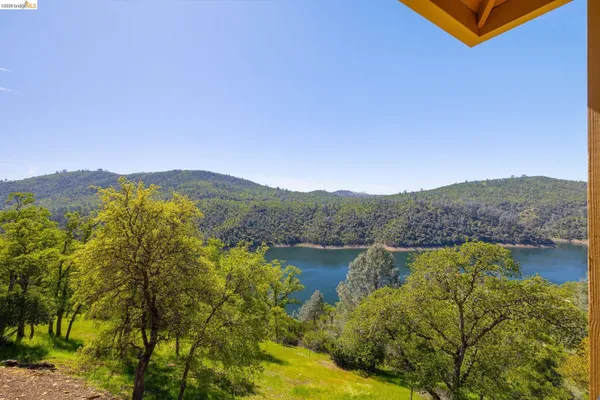 a view of lake with mountain