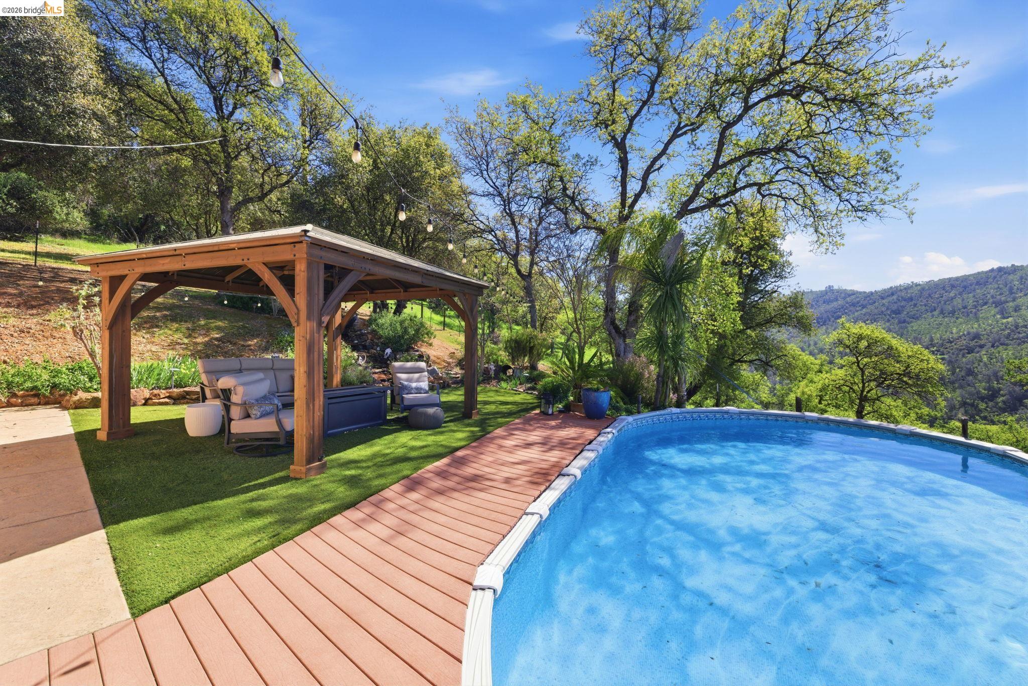 12808 Mammoth Mine Road Jamestown, CA 95327 - Photo 43 of 66 a view of a backyard with garden
