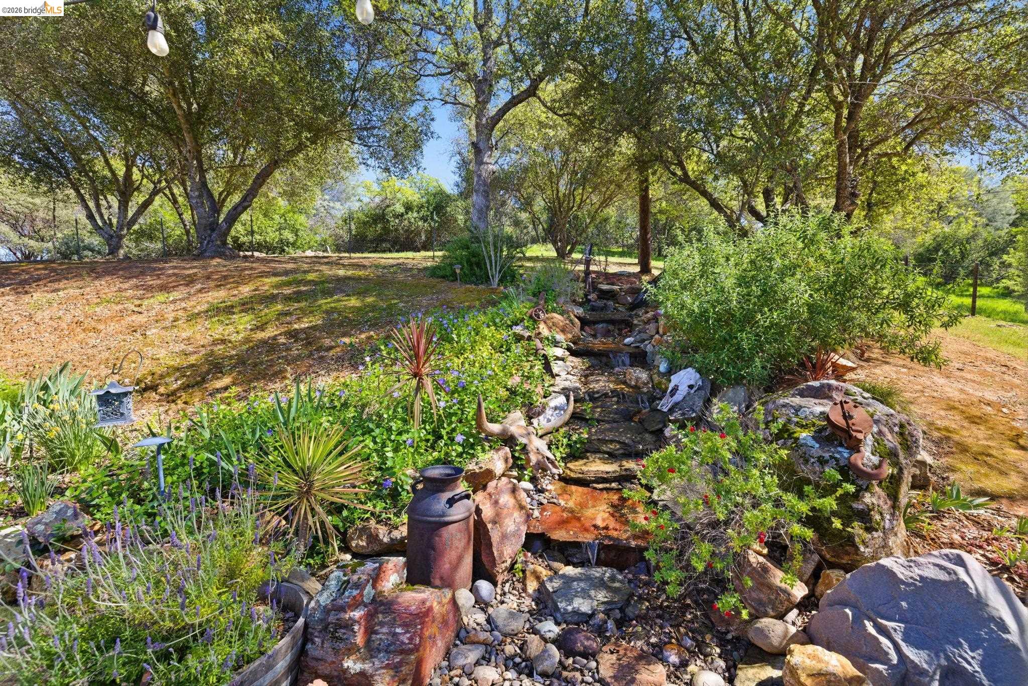 12808 Mammoth Mine Road Jamestown, CA 95327 - Photo 46 of 66 a backyard of a house with a yard and outdoor seating