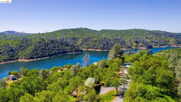 a view of a lake with mountains in the background