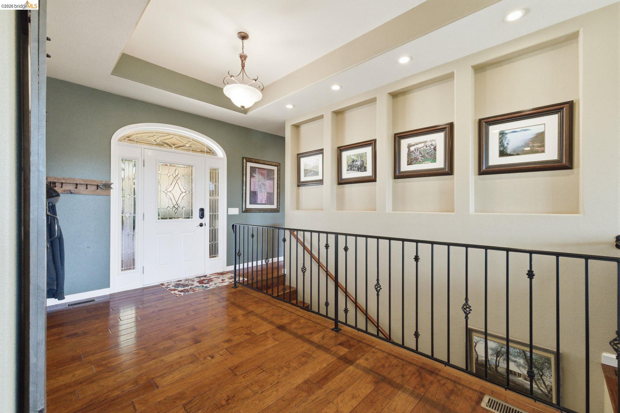 12808 Mammoth Mine Road Jamestown, CA 95327 - Photo 6 of 60 Entrance foyer featuring hardwood / wood-style flooring and a tray ceiling