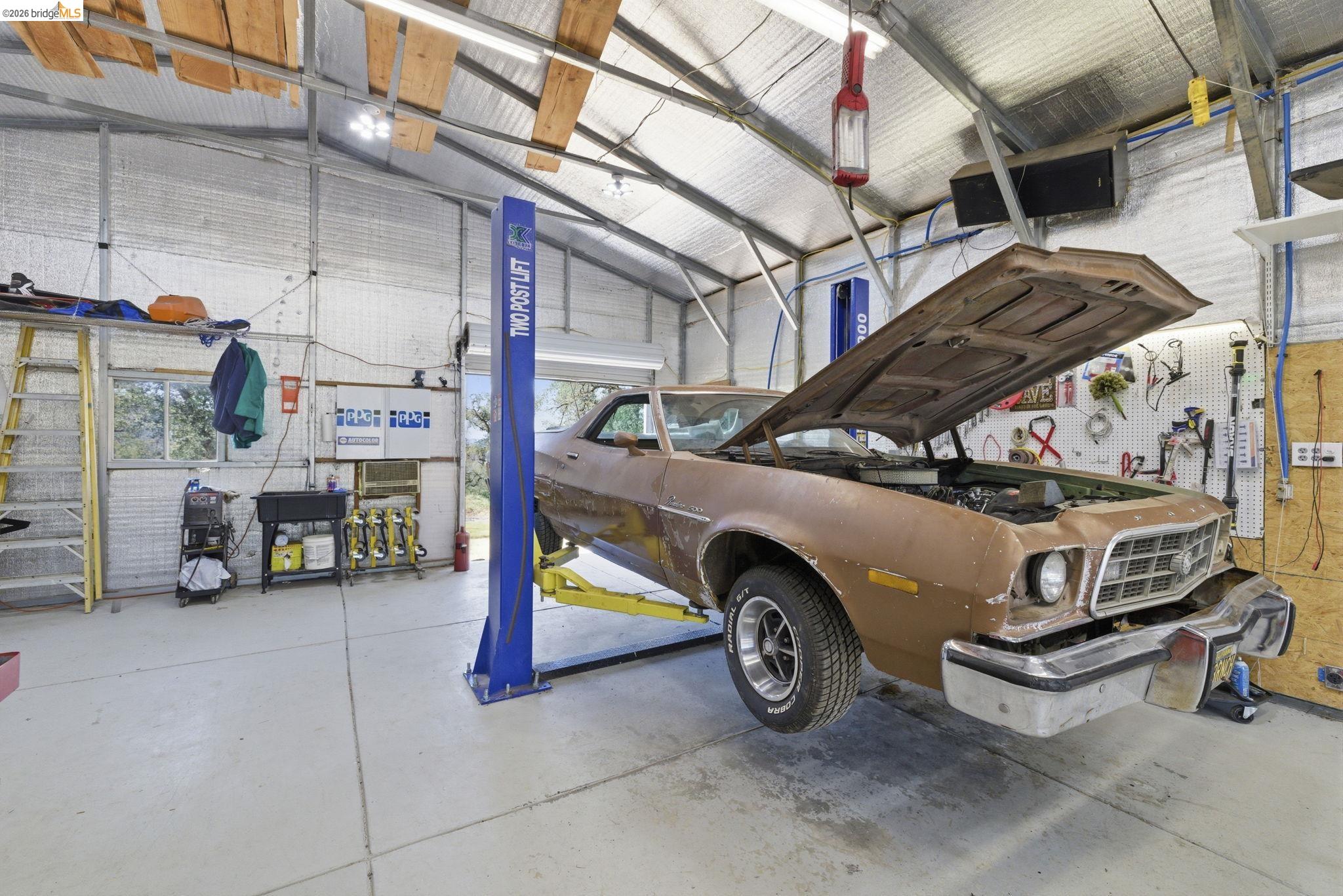 12808 Mammoth Mine Road Jamestown, CA 95327 - Photo 61 of 66 a view of a car garage