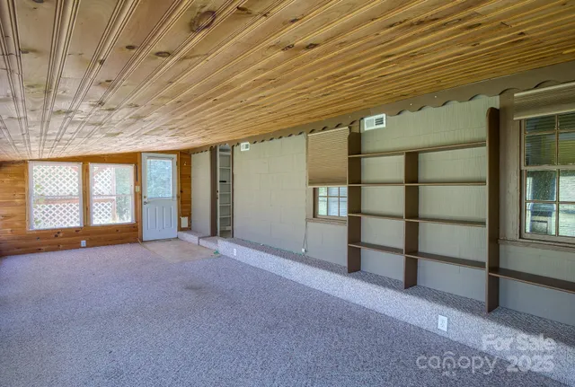 an empty room with windows