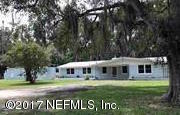 2055 Powell Road St. Augustine, FL 32084 - Photo 1 of 4 a view of a house with a yard